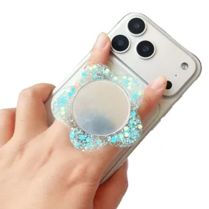 Tragbare Glitzer-Blumen-Acryl-Handyhalterung mit Schminkspiegel auf silbernem Smartphone