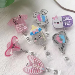 Variety of cute glittery acrylic nurse badge reels with scrub life and chill pill designs