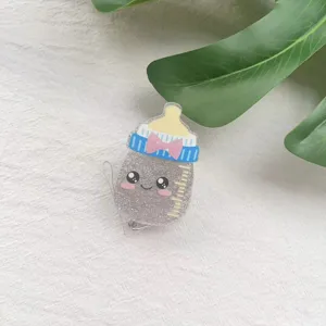 Cute cartoon baby bottle retractable glitter badge reel with a secure alligator clip