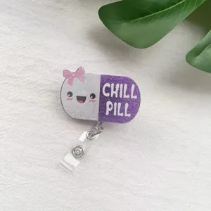 Retractable nurse badge reel with a cute glittery Chill Pill character design