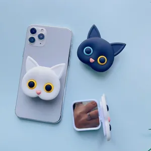 Cute cat-shaped folding phone grip with integrated hidden makeup mirror in white and navy