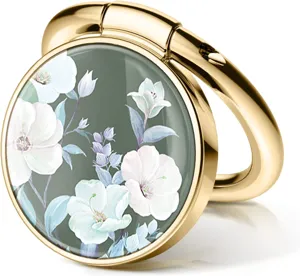 Detailed macro view of an epoxy floral phone ring holder with gold metal frame