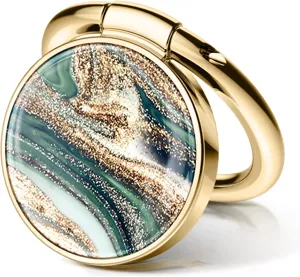 High-quality close-up of a circular golden phone ring stand with green marble inlay