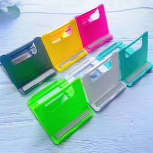 Colorful foldable desktop stands for smartphones and tablets with 4 adjustable angles