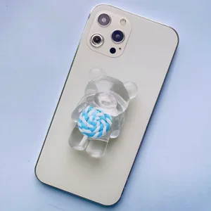 Supporto per cellulare a forma di orsetto trasparente con lecca-lecca blu a spirale