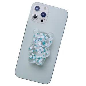 Cute transparent 3D bear collapsible phone grip with white daisy floral patterns