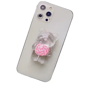 Supporto per telefono a forma di orsetto trasparente con lecca-lecca rosa