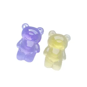 Deux supports de téléphone mignons en forme d'ours en résine violette et jaune translucide