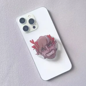 Collapsible acrylic phone grip with cartoon character design on white smartphone