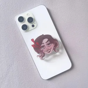 Detail of cartoon character artwork on an acrylic epoxy phone socket grip on white phone