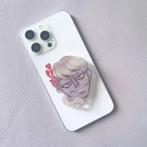 Detailed view of stylized anime character acrylic phone grip on white phone