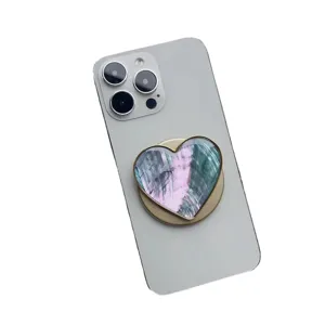 Supporto magnetico per telefono a forma di cuore con trama a conchiglia colorata