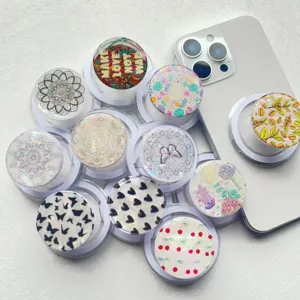 Bunte Magsafe-Handygriffe aus Laser-Muschelpapier mit vielfältigen Kunstmustern.