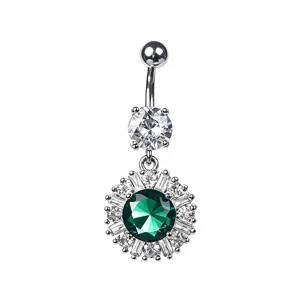 Detail view of a silver belly ring featuring a brilliant emerald green zircon centerpiece.