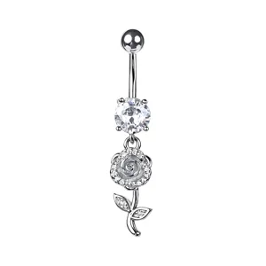 Macro detail of a silver-toned rose flower navel piercing ring with sparkling clear zircon