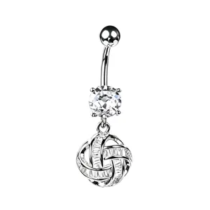 Close-up of silver belly button ring with sparkling zircon and knotted sphere pendant.