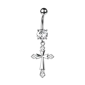 Close-up detail of a silver cross belly button ring decorated with sparkling zircon stones