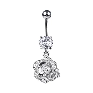 Detailed close-up view of silver navel piercing with zircon and sparkling pavé rose pendant