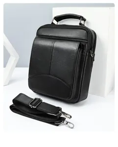 Details of black genuine leather men vertical shoulder bag with zipper and strap.