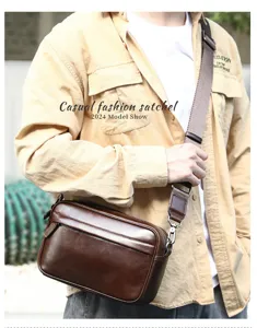 Detailed shot of men brown leather crossbody bag, casual fashion satchel with strap metal hardware