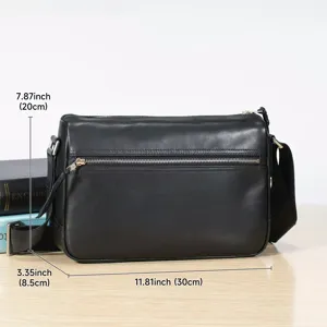 Detailed view of black genuine leather men's shoulder bag featuring clear size markings.