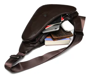 Genuine leather men's chest sling bag detail view showing spacious inner capacity and compartments.