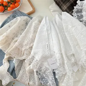 Retro white lace triangle scarf detailed view, vintage floral embroidery hollow mesh bandana chic.
