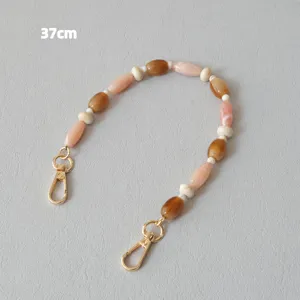 Sangle de 37cm en perles acryliques caramel avec fermoirs mousquetons dorés pour sacs