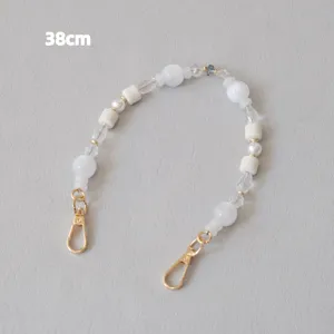 Detailed macro view of 38cm acrylic beaded chain strap with gold lobster clasps