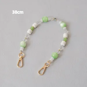 38cm acrylic beaded strap with green and white beads and gold metal lobster clasps
