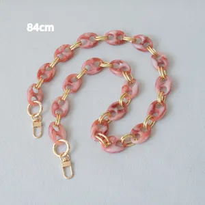 Close-up of 84cm pink marble resin pig nose chain strap with gold clasps