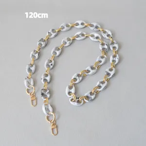 Detail view of 120cm marble resin pig-nose chain strap with golden metal rings and clasps