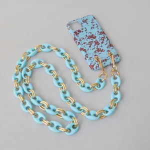 Snoepkleurige acryl varkensneus telefoonketting met gouden schakels en spetter hoesje
