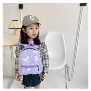 Toddler girl wearing a cute lavender purple backpack with colorful unicorn prints