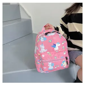 Toddler girl pink backpack featuring cute cartoon unicorn and rainbow prints in use