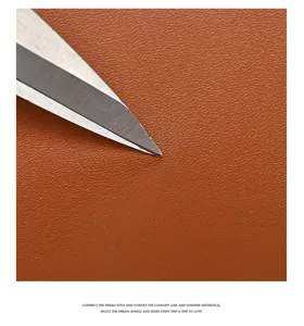 Gros plan sur la texture du cuir marron d'un sac cabas de qualité pour femme
