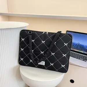Sac fourre-tout noir pour ordinateur portable avec motifs nœuds blancs et poignée