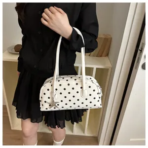 Stylish white polka dot pillow bag for women with cute star charm detail in Korean style