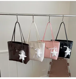 Fashionable summer tote bags in multiple colors featuring decorative star plush charms