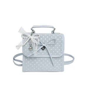 Light blue polka dot backpack with lace bow and pearl heart charm decoration