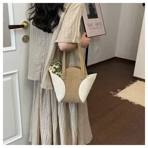 Sac à bandoulière tissé à la main avec design d'aile unique dans un style décontracté