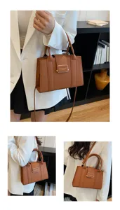 Stylish brown leather tote bag with shoulder strap, perfect for office and daily commute