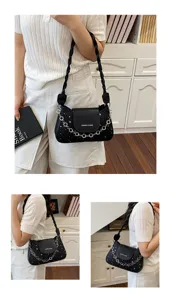 Sac à bandoulière noir élégant avec bandoulière tressée et chaîne argentée décorative
