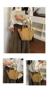Détails montrant la texture d'un grand sac à bandoulière tissé à la main pour femme créative