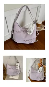 Detailed view of the purple multifunctional tote bag featuring bow knots and a plush bunny charm