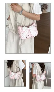 Detail view of pink bubble texture bag with a large white decorative bow