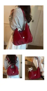 Versatile red Korean style multi-way bag featuring bow charm and star pendant detail