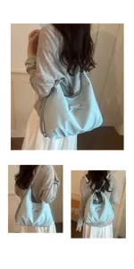 Detailed view of light blue Korean style backpack showing versatile shoulder and back carrying ways