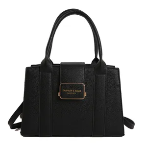 Elegant black pebbled leather tote bag with top handle and crossbody strap
