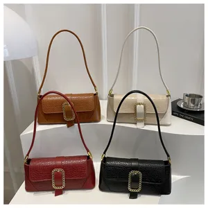 Croc-embossed French style baguette underarm bags displayed in four elegant colors